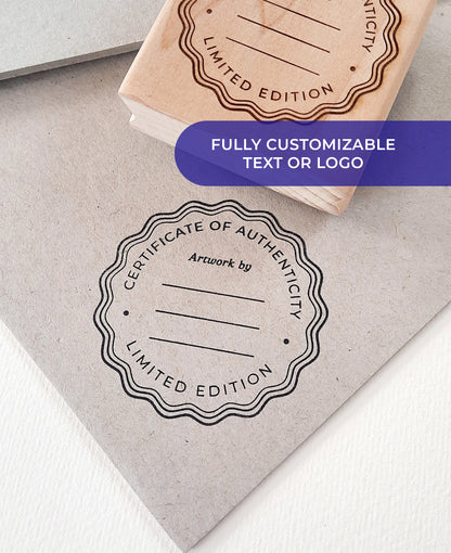 Custom Certificate of Authenticity rubber stamp impression on kraft paper — scalloped seal design by La Booktique