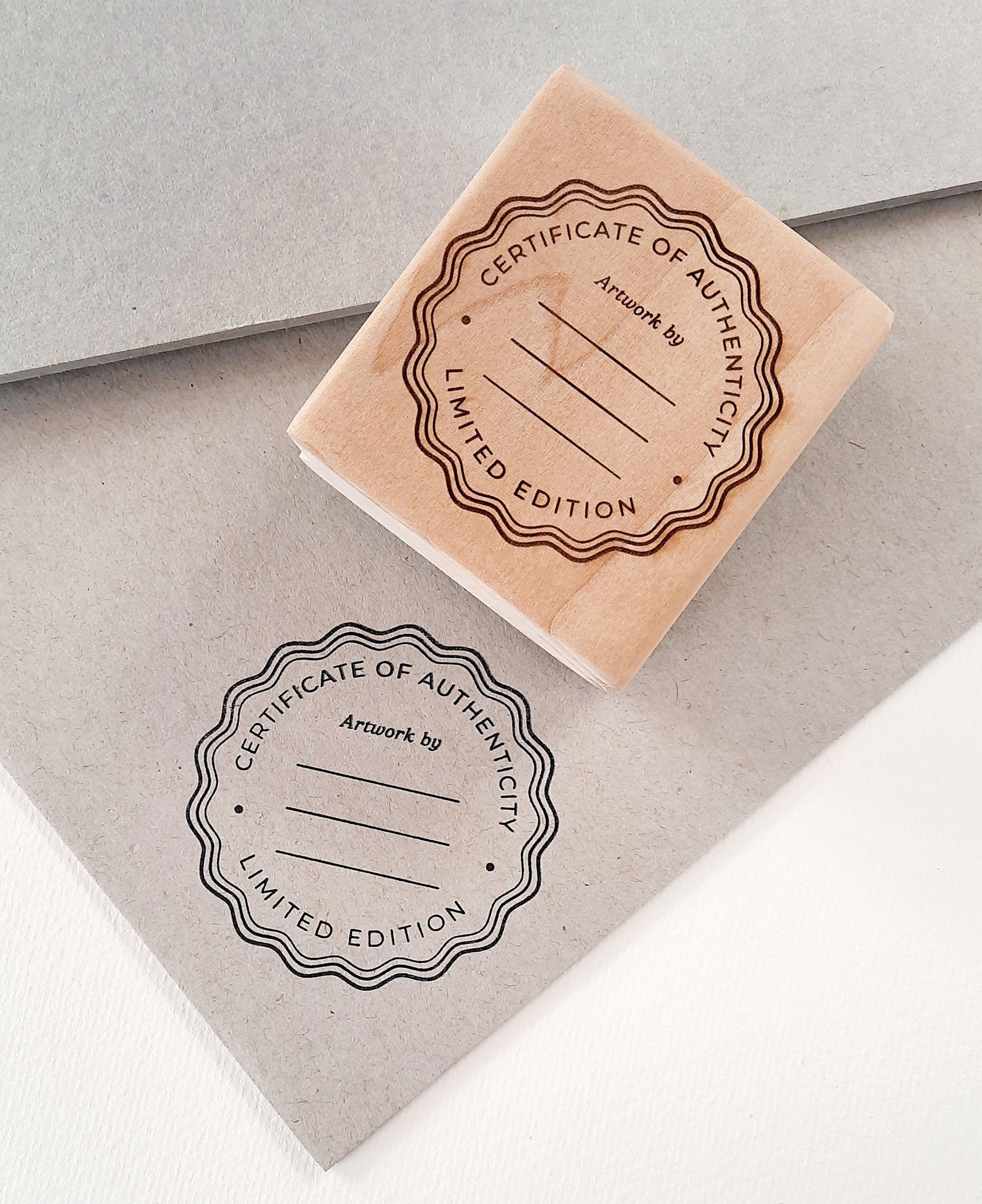 Certificate of Authenticity stamp detail — fully customizable text and logo for artists and makers