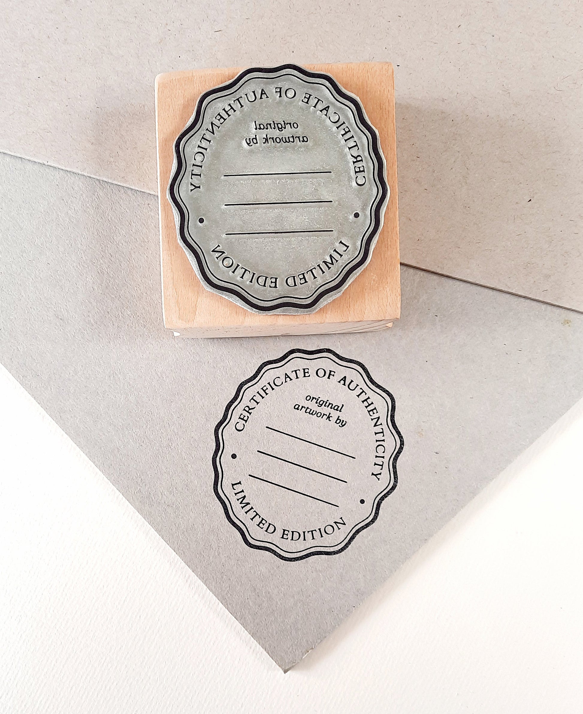 Certificate of Authenticity stamp impression close-up — personalized artist seal by La Booktique