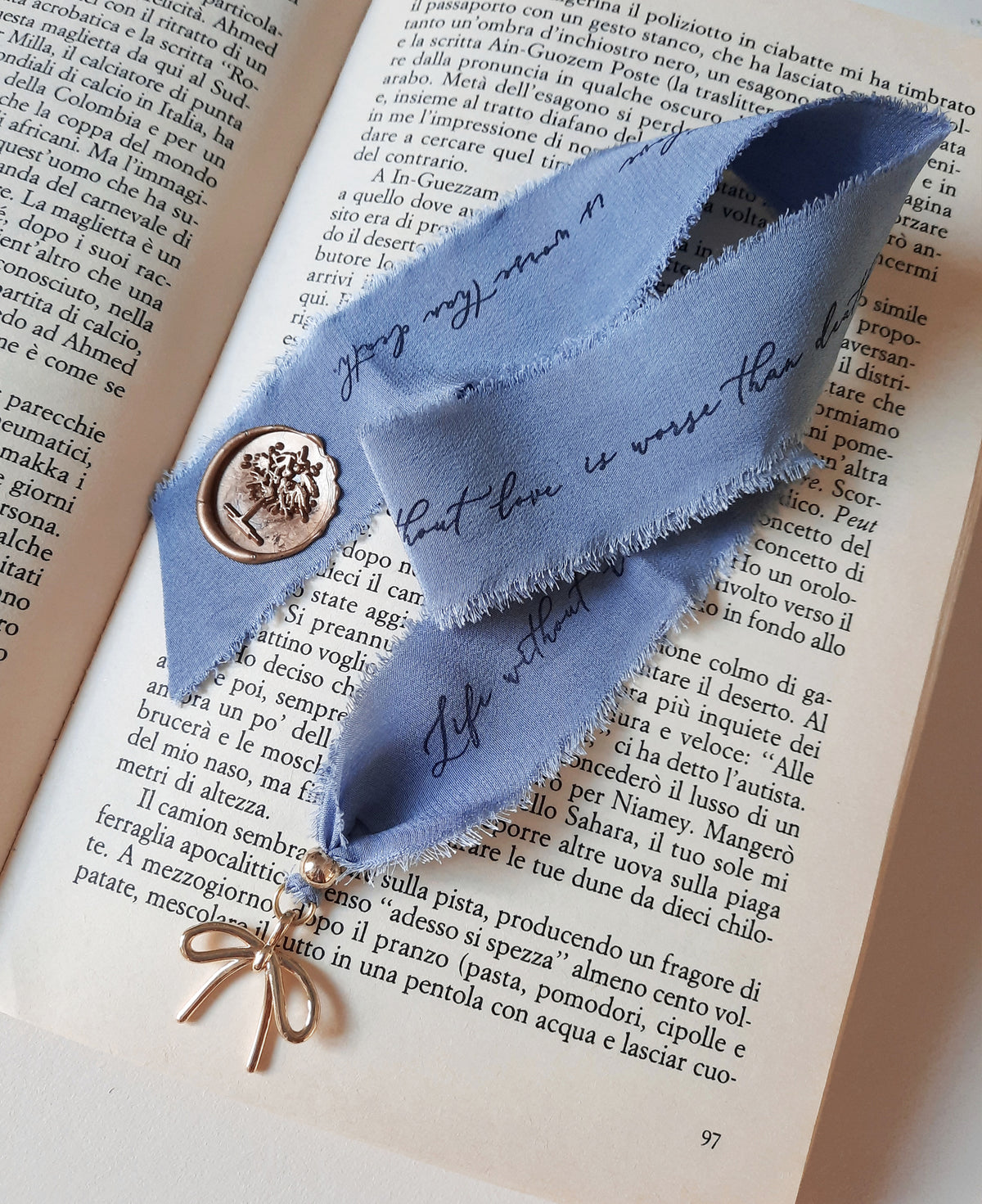 Personalized handmade silk bookmark with gold bow charm and calligraphy ribbon